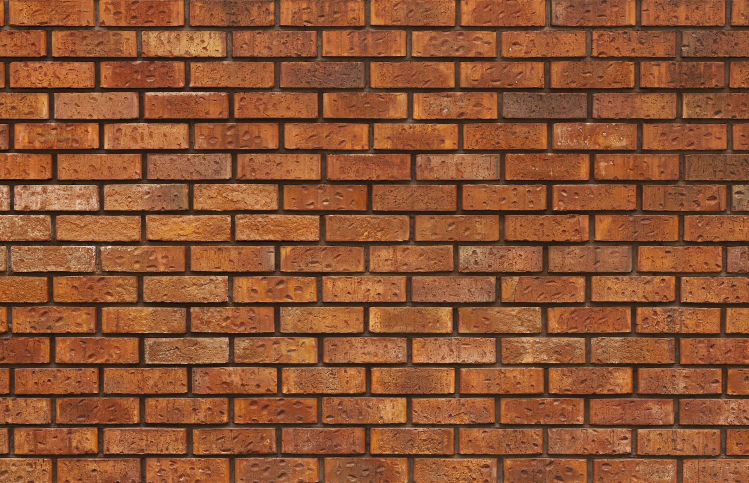 fundo feito de tijolos scaled